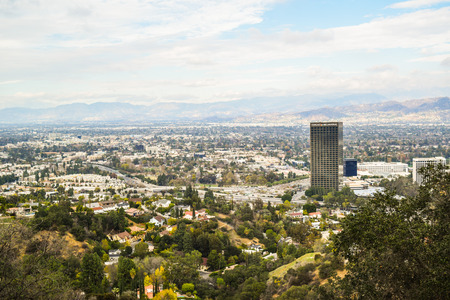 Los Angeles, CA, USA . January 16, 2016: View of the los angele. Good sunny day in downtown Los Angeles, California. Aerial view of Los angeles city from Runyon Canyon park Mountain Viewのeditorial素材