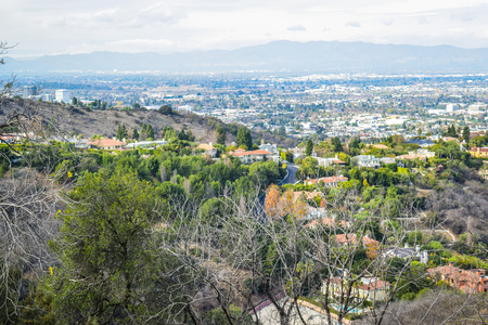Los Angeles, CA, USA . January 16, 2016: View of the los angele. Good sunny day in downtown Los Angeles, California. Aerial view of Los angeles city from Runyon Canyon park Mountain Viewのeditorial素材