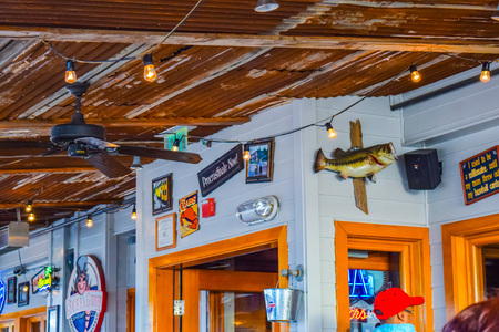 Santa Monica, CA, USA â January 11, 2016: Santa Monica California pier at sunset 66 sign. The roller coaster at the amusement park souvenirsのeditorial素材