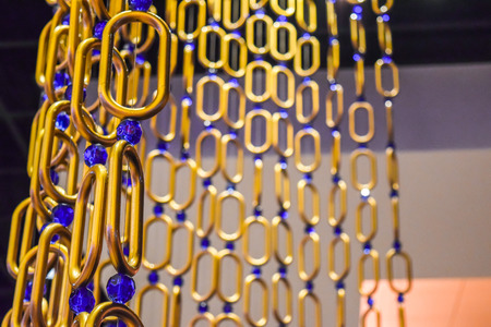 Long and wide chain curtains gold toneの写真素材