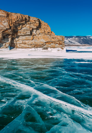 very cool pure ice of the frozen lake with clean fresh . lake Baikalの写真素材