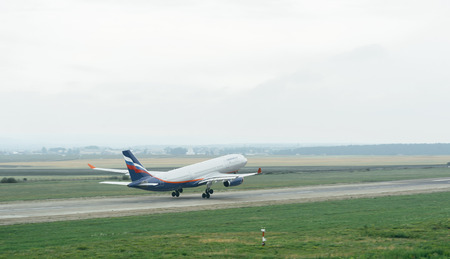 Plane takes off from the company "Aeroflot" runwayのeditorial素材