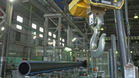RUSSIA, ANGARSK - JUNE 8, 2018: Industrial type 5000 kg digital weight scale hanging on hook of the...