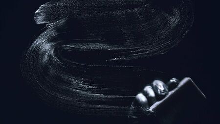 Internal view from inside of the glass a car while being car wash. Washing dishes with a sponge with dishwashing foam gel. Hand holds sponge with detergent or polishing liquid. Polish, or wash dish.の写真素材