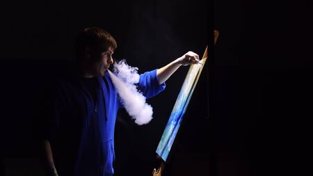 Artist copyist paint seascape with ship in ocean. Vaper smoke vape e-cigarette. Craftsman decorator...