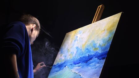 Artist copyist paint seascape with ship in ocean. Vaper smoke vape e-cigarette. Craftsman decorator...