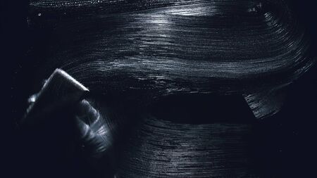 Internal view from inside of the glass a car while being car wash. Washing dishes with a sponge with dishwashing foam gel. Hand holds sponge with detergent or polishing liquid. Polish, or wash dish.の写真素材