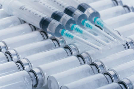 Medicine, Injection, vaccine and disposable syringe, drug concept. Sterile vial medical syringe...