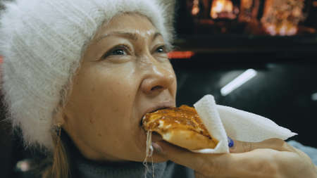 Girl eat pizza cheese four. Close up of young woman mouth greedily eating pizza and chewing in...