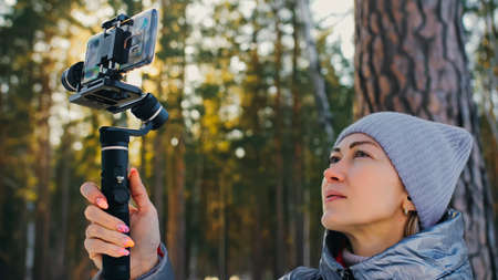 Woman Holding On Handheld Film 3-axis Gimbal Stabilization Devic