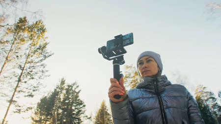 Woman Holding On Handheld Film 3-axis Gimbal Stabilization Devic