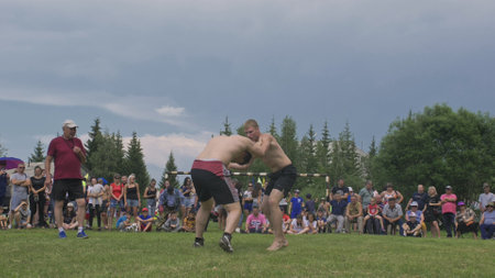 Odinsk, Russia - June 29 2019: Buryat national sport wrestling. Holiday Sur Harban. Surkharban Buryat fight, struggle, fighting battle.のeditorial素材