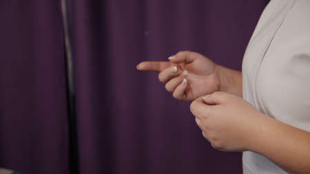 Woman receiving anti-cellulite pressotherapy lymphatic massage drainage machine, hardware cosmetology apparatus in spa salonの写真素材