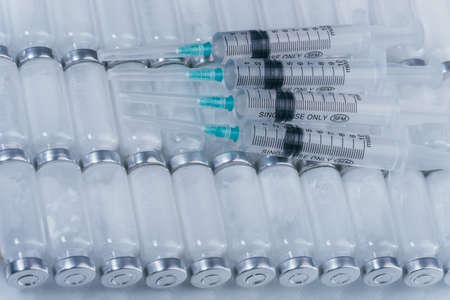 Medicine, Injection, vaccine and disposable syringe, drug concept. Sterile vial medical syringe...