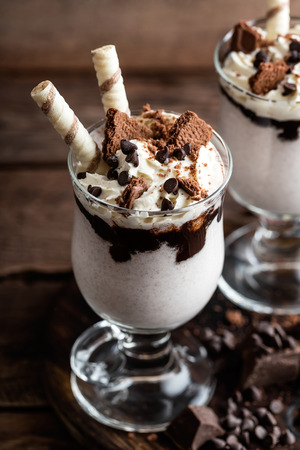 delicious milkshake with ice cream, chocolate and cookiesの写真素材