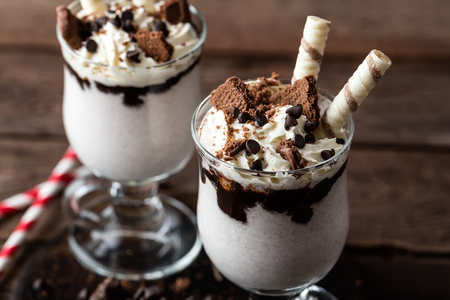 delicious milkshake with ice cream, chocolate and cookiesの写真素材