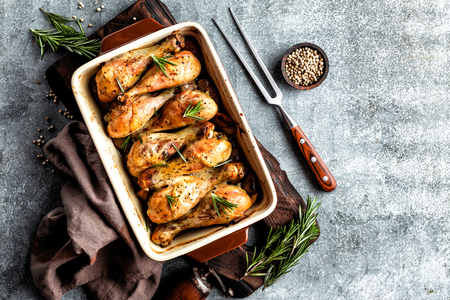 Baked chicken drumsticks in the ovenの写真素材