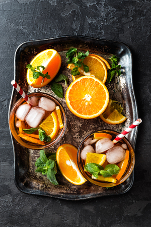 homemade flavored orange iced tea, refreshing summer beverageの写真素材