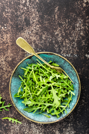 fresh crunchy juicy arugula leavesの写真素材