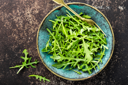 fresh crunchy juicy arugula leavesの写真素材