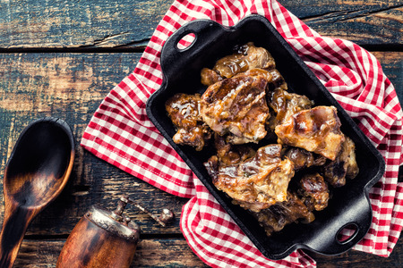 baked meat in cast iron dishの写真素材