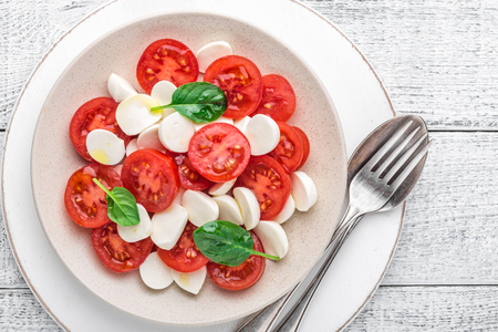 plate of a simple traditional Italian salad capreseの写真素材