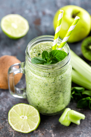 green smoothie with celery, apple, kiwi and lime. healthy diet eating, superfoodの写真素材