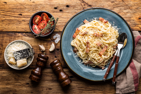 pasta carbonara, spaghetti, cooked according to the traditional Italian recipe pasta alla carbonara with egg sauce and fried pancettaの写真素材