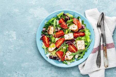chicken breast salad with fresh vegetables top view and space for a textの写真素材