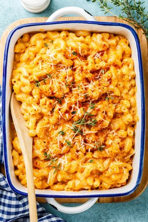 Mac and cheese. traditional american dish macaroni pasta and a cheese sauceの写真素材