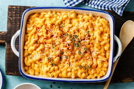 Mac and cheese. traditional american dish macaroni pasta and a cheese sauceの写真素材