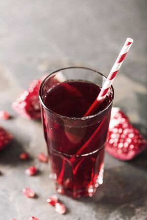 Natural pomegranate juice in a glassの写真素材