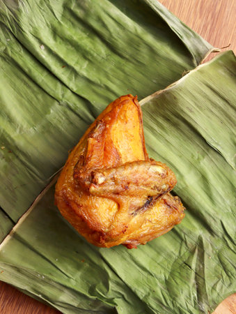 ayam goreng fried chicken indonesian homemade herbs asian plate cooking nasi food wood culinary hotの写真素材