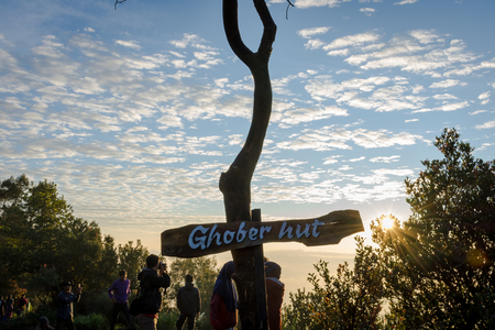 Garut, Indonesia - August 12, 2018 : A group of young people are enjoying and hiking Papandayan Mountain. Papandayan Mountain is one of the favorite place to hike on Garut.のeditorial素材