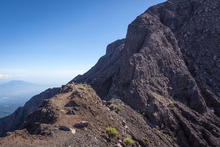 An extreme track to Raung mount summit called 'Puncak Sejati'. Raung is the most challenging of all Javaâs mountain trails, also is one of the most active volcanoes on the island of Java in Indonesia.の写真素材