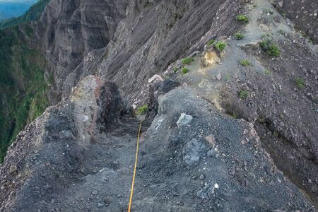 An extreme track to Raung mount summit called 'Puncak Sejati'. Raung is the most challenging of all Javaâs mountain trails, also is one of the most active volcanoes on the island of Java in Indonesia.の写真素材