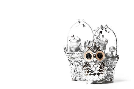 Christmas toys on a white background. Christmas owl toy against white isolated background....
