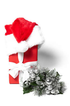 New Year's composition. Christmas decorations. Christmas Gift Box, Santa Claus Hat Flat Lay, Copy Spaceの写真素材