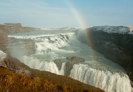 people in background on a viewpoint in gullfoss waterfall in icelandの写真素材