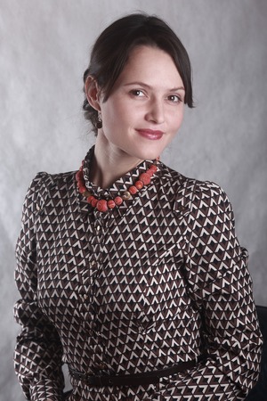 Portrait of a business woman with coral beadsの写真素材