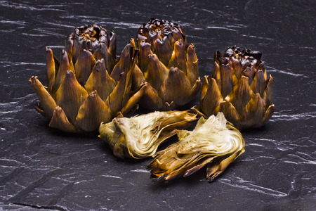 grilled artichoke slate stoneの写真素材