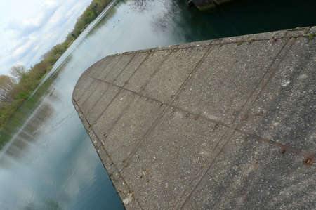 The domination of man over nature. Beautiful view of the lake and the surrounding area. Artificially created attraction. Power, endurance and beauty at the same time. The dam that stops the river.の写真素材