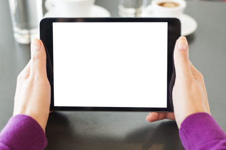 Woman using her Digital Tablet in officeの写真素材