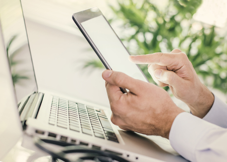 Cropped shot of a male doctor using digital tablet.Modern technology and medicine.