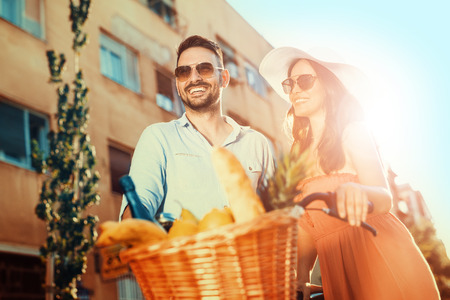 Close up portrait of attractive young couple in love outdoors.の写真素材