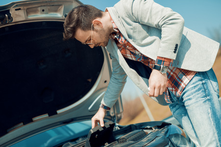 Man having problem with car.の写真素材