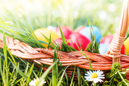 Colorful easter eggs.A basket of brightly colored Easter eggs.Selective focus on basket.