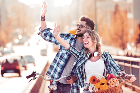 Portrait of a happy couple enjoying spending time together in the city.の写真素材