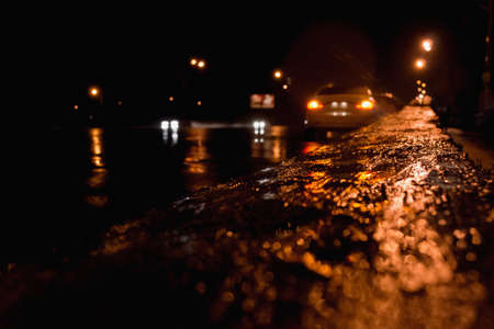 Blurred lights of the night city with carの写真素材