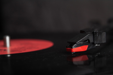 Close-up turntable needle and vinyl diskの写真素材